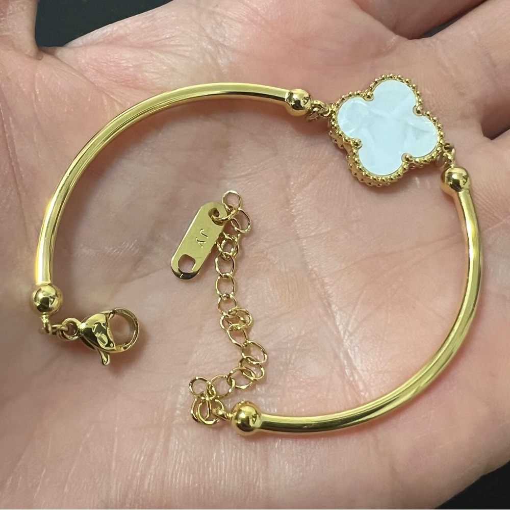 Elegant Gold and White Bracelet